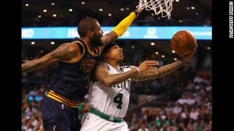 The Boston Celtics traded Isaiah Thomas, right, to the Cleveland Cavaliers for Kyrie Irving, left.