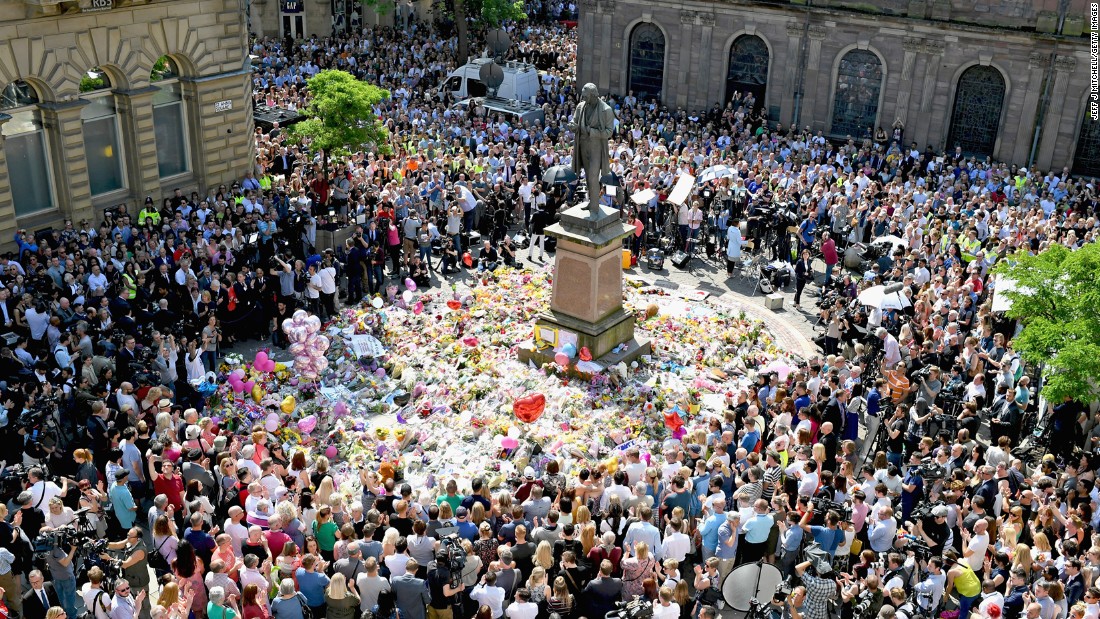People in Manchester, England, gather in St. Ann&#39;s Square on Thursday, May 25. They were observing a national minute of silence to remember &lt;a href=&quot;http://edition.cnn.com/2017/05/23/europe/manchester-attack-victims/index.html&quot; target=&quot;_blank&quot;&gt;the victims &lt;/a&gt;of a suicide bombing at an Ariana Grande concert.
