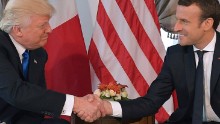 Donald Trump and  Emmanuel Macron shake hands ahead of a working lunch on the sidelines of the NATO summit in Brussels, on May 25, 2017.