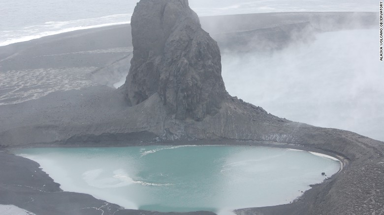 This May 8 file photo of the Bogoslof volcano in Alaska's Aleutian islands shows a crater now filled by a warm saltwater lake. The volcano erupted on Bogoslof Island on Sunday, May 28, producing an ash cloud that reached up to 45,000 feet, according to the Alaska Volcano Observatory.