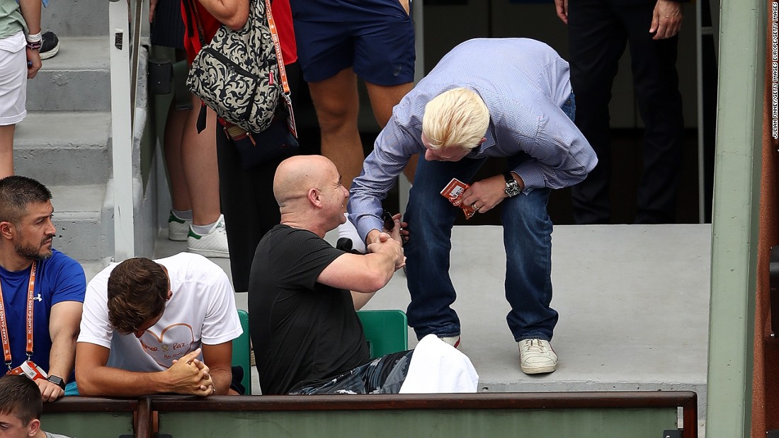 The Serb has a new so-called &quot;super coach&quot; at the helm in eight-time grand slam champion Andre Agassi, but that didn&#39;t stop former coach Boris Becker turning up in the player&#39;s box during the third set.