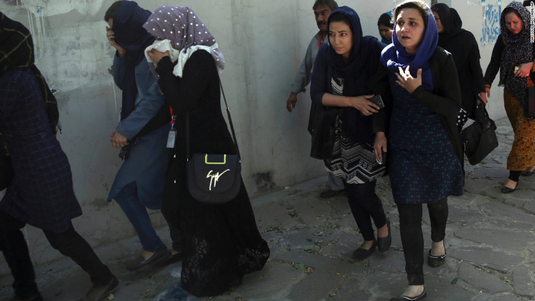 Office workers leave the site of the suicide attack. German Foreign Minister Sigmar Gabriel said the attack was &quot;aimed at civilians and those who are in Afghanistan to work with the people there for a better future of the country.&quot;