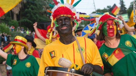 Fans wore black face paint and carried bananas in a parade in Sochi, Russia, before the Confederations Cup in 2017.