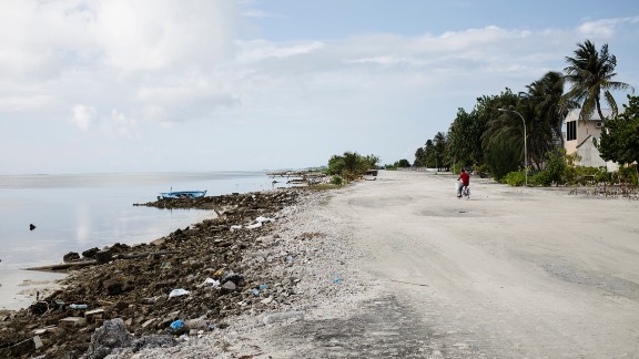 Low tide reveals the extent of accelerated erosion shown by the amount of exposed beach rocks on Maafushi beach in the Maldives. This is the world's lowest-lying country, with no part lying more than six feet above sea level. The island nation's future is under threat from anticipated global sea level rise, with many of its islands already suffering from coastal erosion.