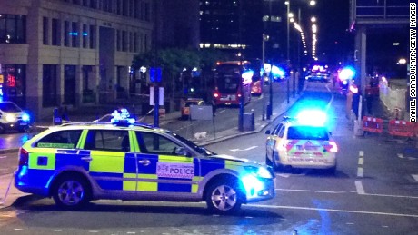 A photograph taken on a mobile phone shows British police cars blocking the entrance to London Bridge, in central London on June 3, 2017, following an incident on the bridge. 
Police are dealing with a &quot;major incident&quot; on London Bridge, Transport for London said on Saturday, after witnesses reported seeing a van mounting the pavement and hitting pedestrians. / AFP PHOTO / Daniel SORABJI        (Photo credit should read DANIEL SORABJI/AFP/Getty Images)
