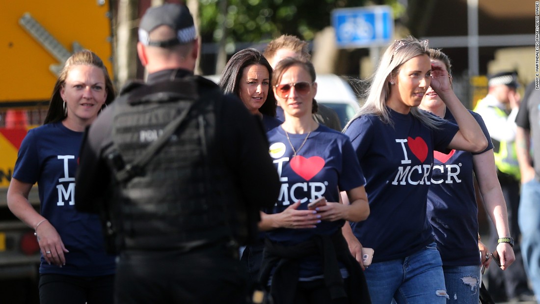  A strong police presence is seen outside the event. 