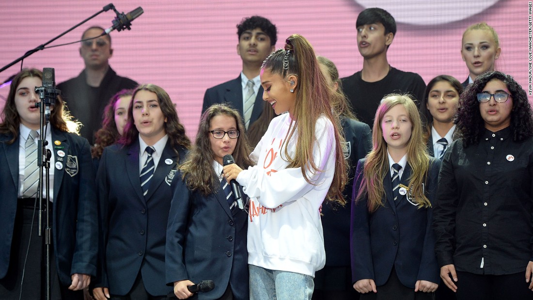 Ariana Grande performs with The Children&#39;s Choir. 