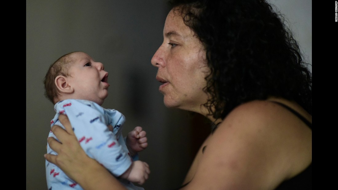 The Zika epidemic presented a threat to the health of Puerto Ricans as well as a blow to the island&#39;s tourism industry. While the &lt;a href=&quot;http://www.cnn.com/2017/06/06/health/zika-puerto-rico-epidemic-over-bn/index.html&quot;&gt;crisis was declared over&lt;/a&gt; in June 2017, more than 35,000 cases were reported there in 2016, and a public health emergency was enacted. Here, Michelle Flandez holds her son Inti Perez, diagnosed with microcephaly linked to the mosquito-borne virus.