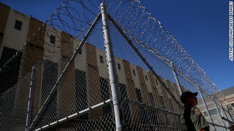 An armed officer stands guard at death row in San Quentin, California.