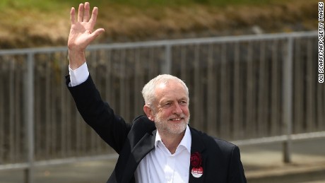 Britain&#39;s main opposition Labour Party leader Jeremy Corbyn waves as he arrives to address supporters at a campaign visit in Colwyn Bay, north Wales on June 7, 2017, on the eve of the general election.
Britain on Wednesday headed into the final day of campaigning for a general election darkened and dominated by jihadist attacks in two cities, leaving forecasters struggling to predict an outcome on polling day. / AFP PHOTO / Oli SCARFF        (Photo credit should read OLI SCARFF/AFP/Getty Images)