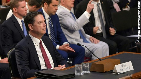Former FBI Director James Comey arrives to testify during a US Senate Select Committee on Intelligence hearing on Capitol Hill in Washington,DC, June 8, 2017. / AFP PHOTO / Mandel NGAN        (Photo credit should read MANDEL NGAN/AFP/Getty Images)