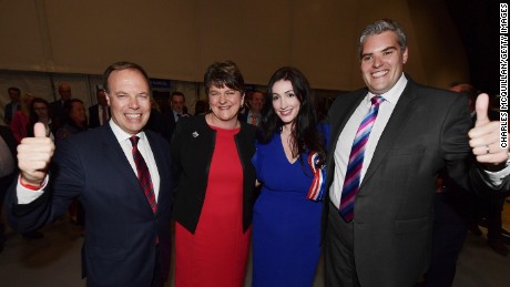 DUP leader Arlene Foster, DUP deputy leader and north Belfast candidate Nigel Dodds, Emma Little Pengelly  DUP south Belfast candidate and Gavin Robinson DUP east Belfast candidate celebrate at the Belfast count centre on June 9, 2017 in Belfast. 