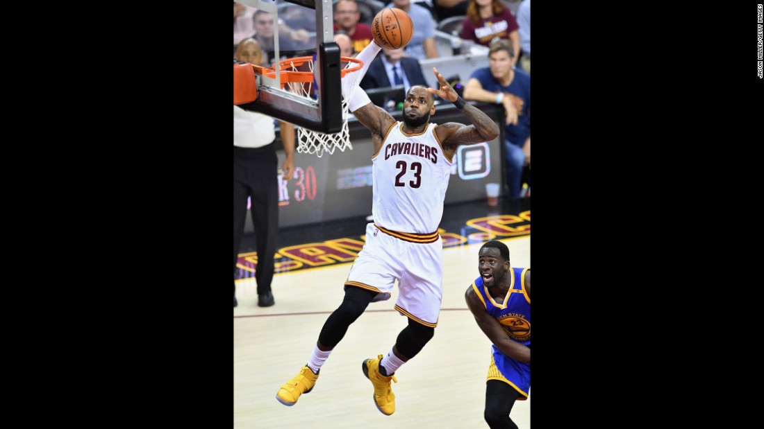 James dunks the ball during Game 4. The Cavaliers scored a Finals-record 86 points in the first half. They also made 24 3-pointers in the game, a Finals record and just one away from the all-time league record.