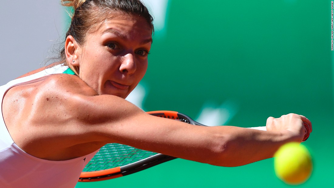 Simona Halep backhands the ball back to Ostapenko. The Romanian possesses a counter-punching game and against Ostapenko could do nothing but react to her opponent&#39;s booming ground strokes. 