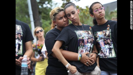 Angel Ayala, left, and Carla Montanez mourn the loss of their best friend.