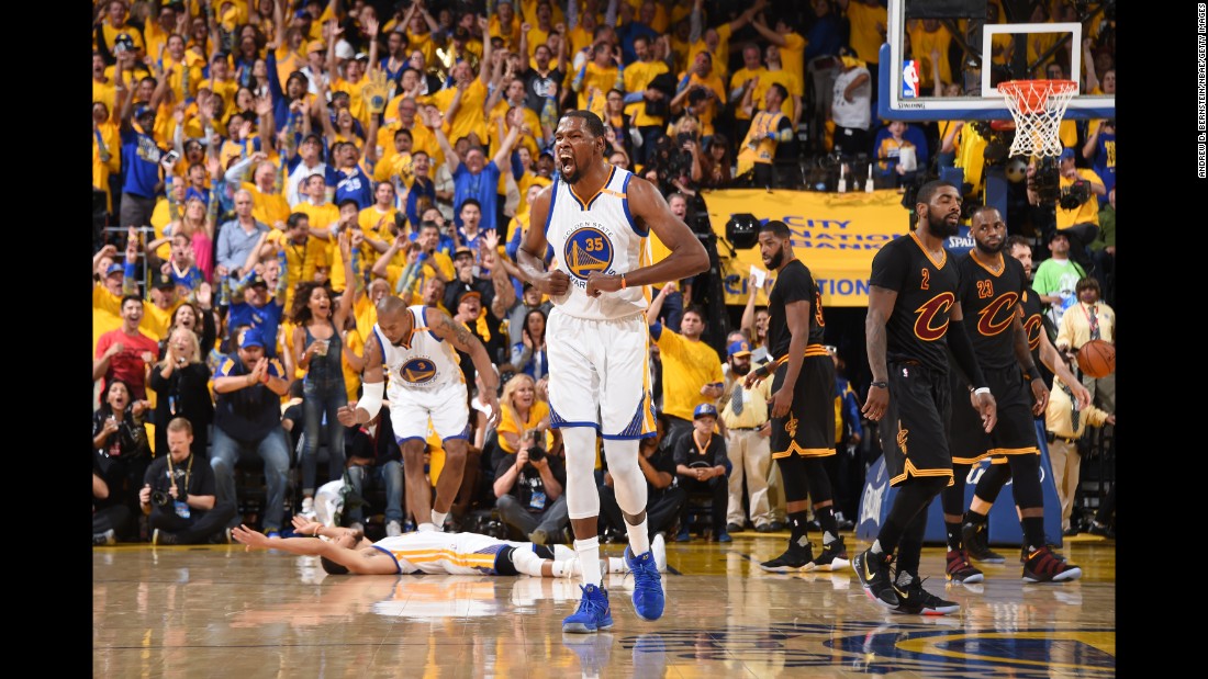 Kevin Durant, center, celebrates at the end of Game 5. This was the first title for Durant, who signed with the Warriors before this season. He was named the Finals&#39; Most Valuable Player.