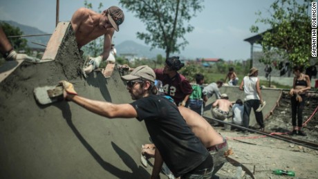 Verghese works on building a ramp inside a skate park.