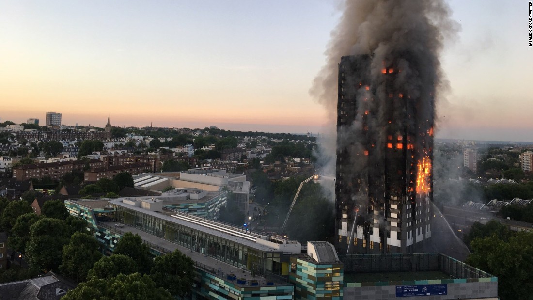 Firefighters battle the massive blaze.