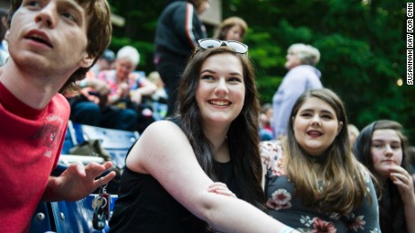 Grace Bannister joins friends before the start of &quot;Hairspray&quot; at Chief Logan State Park in Logan, West Virginia. &quot;A lot of what you hear about this place is the negative, but we have so many positives,&quot; she said. &quot;We have such a rich culture and feeling of community in this area, because when you grow up in a place of hardship, it really bonds a group of people together.&quot; 