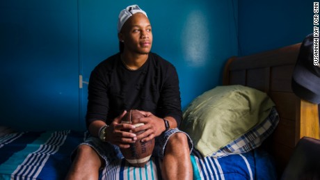 Joseph Hayes, 17, sits in his bedroom in Premier, West Virginia. Hayes has felt supported growing up black in a predominantly white community in McDowell County. &quot;People here really don&#39;t see color.&quot; 