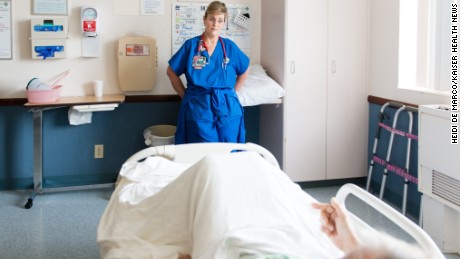 Dawn Nagel checks in on Scott Steffens at St. Joseph Hoag Health in Orange County, California.