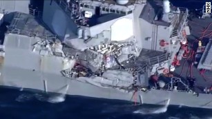 Initial investigation blames Navy for collision