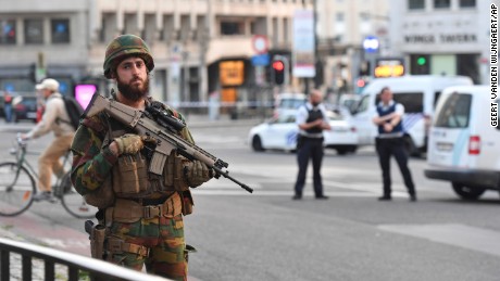 A Belgian Army soldier stands outside Central Station after a reported explosion in Brussels on Tuesday, June 20, 2017. Belgian media are reporting that explosion-like noises have been heard at a Brussels train station, prompting the evacuation of a main square. (AP Photo/Geert Vanden Wijngaert)