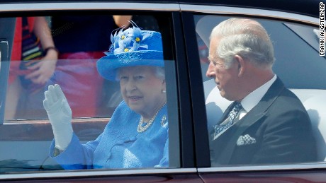 Queen Elizabeth II leaves Buckingham Palace with Prince Charles on Wednesday. 