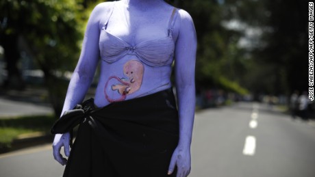 A woman participates in a march on the International Day of Action for the Decriminalization of Abortion in 2012.