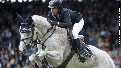 US American Laura Kraut on Cedric clears an obstacle during the North Rhine Westphalia jumping prize at the CHIO World Equestrian Festival in Aachen on July 6, 2012.  Kraut took third place. The CHIO, the last major equestrian event before the London Olympics, takes place from 03 to 08 July AFP PHOTO / JOHN MACDOUGALL        (Photo credit should read JOHN MACDOUGALL/AFP/GettyImages)