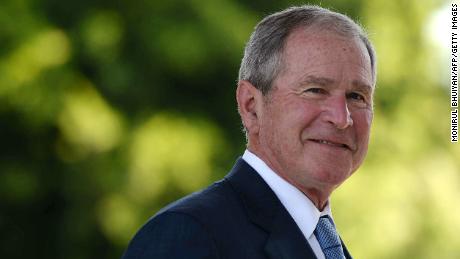 Former United States of America President George W. Bush looks on upon his arrival at the Theresanyo Primary school, on April 4, 2017, in Gaborone, during a two day official visit in Botswana. 