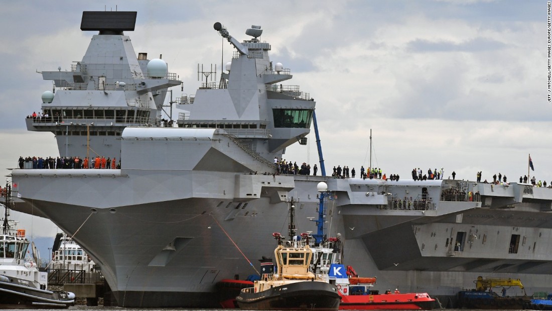 Massive new aircraft carrier pushes from dock - CNN Video