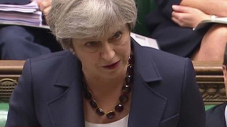 British PM faces pressure after tower fire