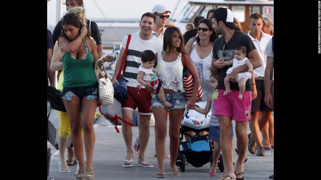 Messi and Roccuzzo are pictured on holiday in Ibiza with Cesc Fabregas and his girlfriend Daniella Semaan, who are expected to attend the wedding.