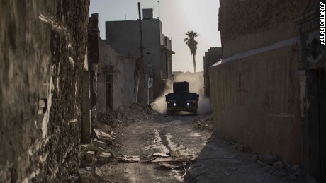 An Iraqi special forces humvee rides through the Old City on June 29.