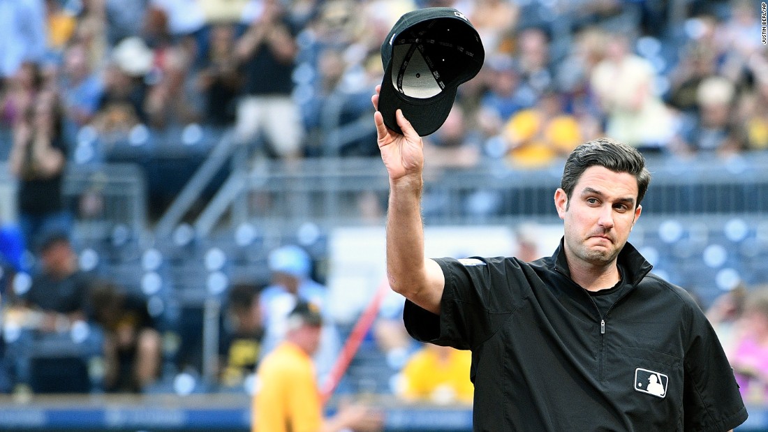 MLB umpire pulls woman from edge of Roberto Clemente Bridge in