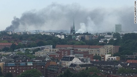 Police say protesters have set vehicles and other objects on fire in Hamburg.