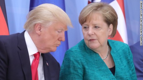 German Chancellor Angela Merkel (R) and US President Donald Trump attend a panel discussion titled &quot;Launch Event Women&#39;s Entrepreneur Finance Initiative&quot; during the G20 summit in Hamburg, northern Germany, on July 8, 2017.
Leaders of the world&#39;s top economies gather from July 7 to 8, 2017 in Germany for likely the stormiest G20 summit in years, with disagreements ranging from wars to climate change and global trade. / AFP PHOTO / POOL / Michael Kappeler        (Photo credit should read MICHAEL KAPPELER/AFP/Getty Images)
