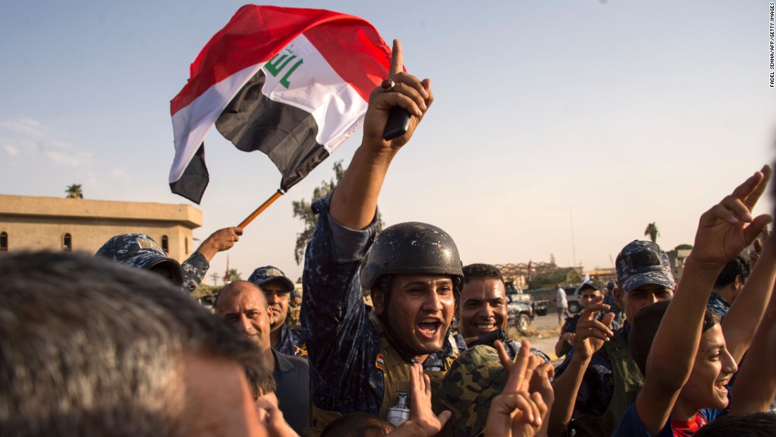 Members of the Iraqi federal police wave the country&#39;s flag as they celebrate in the Old City of Mosul on July 9, 2017. &lt;a href=&quot;http://www.cnn.com/2017/07/09/middleeast/iraq-mosul-victory-claimed/index.html&quot; target=&quot;_blank&quot;&gt;Iraq declared victory against ISIS forces in Mosul &lt;/a&gt;after a grueling monthslong campaign. The battle to reclaim Mosul, the last major ISIS stronghold in Iraq, has been underway since fall 2016.