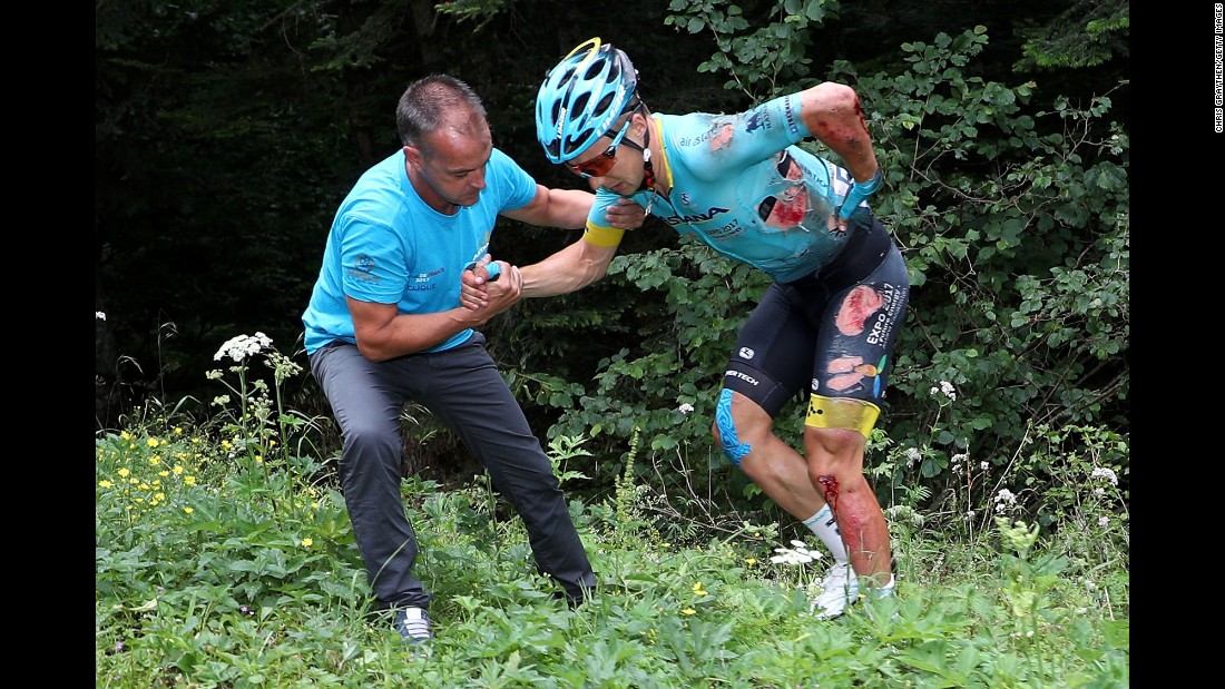 Team Astana&#39;s Alexey Lutsenko is helped from the bushes after crashing during stage nine from Nantua to Chambéry. The same corner claimed Lutsenko&#39;s teammate Bakhtiyar Kozhatayev as another victim, with Thomas suffering the same fate as the chasing pack arrived minutes later.