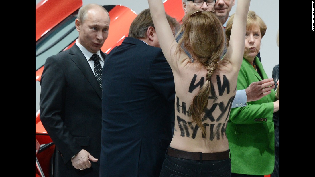 A topless protester shouts at Putin and German Chancellor Angela Merkel during a visit to central Germany in April 2013. That month, Putin &lt;a href=&quot;http://www.cnn.com/2013/04/25/world/europe/russia-putin-questions/index.html&quot; target=&quot;_blank&quot;&gt;defended his government&#39;s record on free speech&lt;/a&gt; and rejected a claim that it uses &quot;Stalinist&quot; methods to clamp down on critics and activists. Two international rights groups had issued scathing reports on Putin&#39;s presidency, saying changes to the law had helped authorities stifle dissent. 