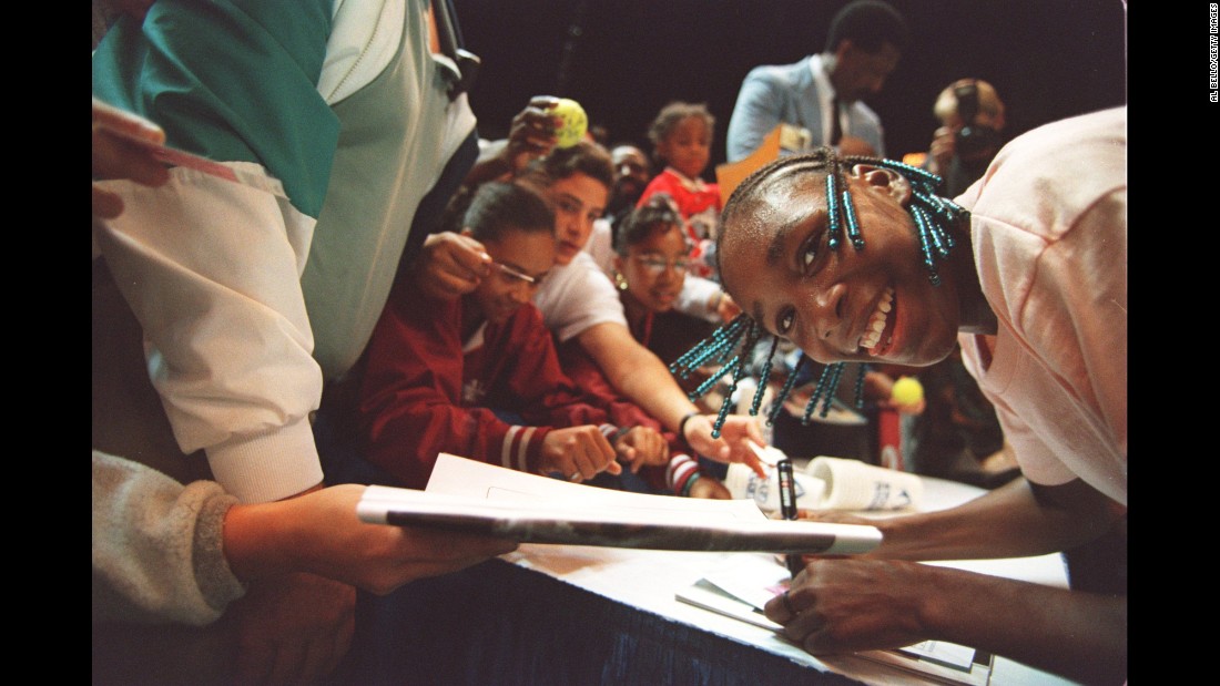 Venus signs autographs after winning her professional debut in October 1994. She was 14 years old when she defeated Shaun Stafford at the Bank of the West Classic in Oakland, California.