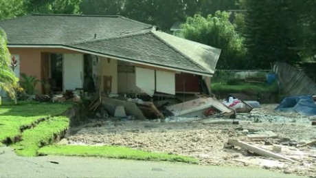 Watch Massive Sinkhole Swallow Home