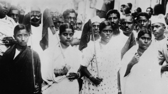 Indian women volunteers carry flags and parade through the streets of Madras, south India, protesting for the country