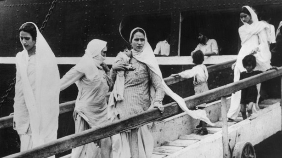 Hindu and Sikh women arrive in Mumbai with their children on a British-India liner after flying from Pakistan on October 9, 1947.

Women were the victims of brutal violence during partition. It is estimated that 75,000 women were abducted and raped.