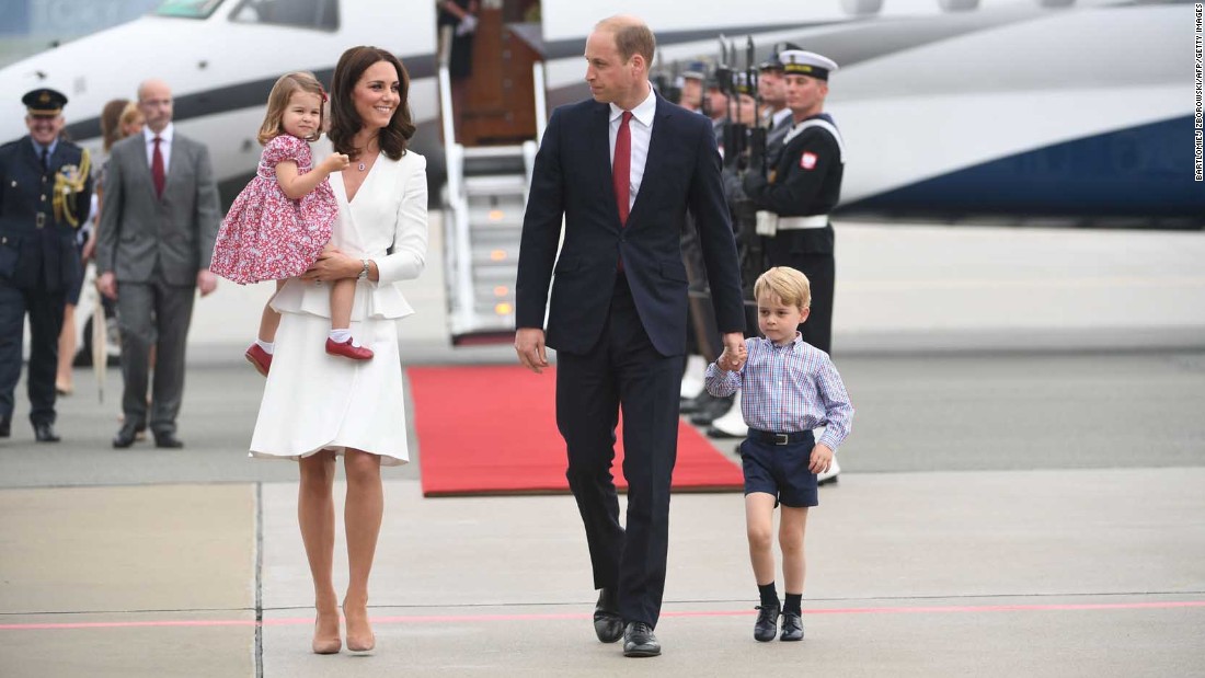 The royal couple disembarks with their children upon arrival on July 17, at the airport in Warsaw, Poland.