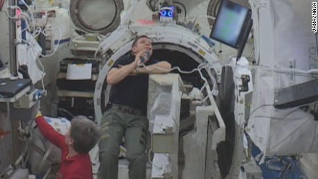 Astronauts Peggy Whitson and Jack Fischer float in space with &quot;Int-Ball,&quot; July 2017. 