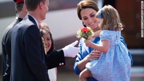 Britain&#39;s littlest ambassador received flowers matching her mom&#39;s bouquet. 