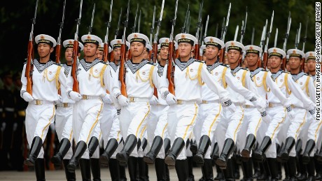 Chinese People&#39;s Liberation Army navy soldiers of a guard of honor rehearse before a welcoming outside the Great Hall of People.