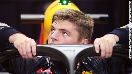 Max Verstappen slips into his Red Bull car fitted with the &#39;Halo&quot; at the 2016 Italian Grand Prix weekend.